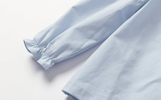 Blusa con Botones Traseros y Lazo en el Cuello — Niña